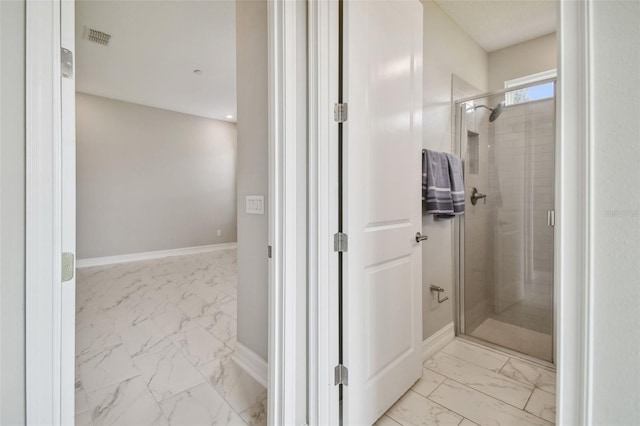 bathroom with an enclosed shower