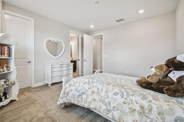 bedroom featuring light colored carpet