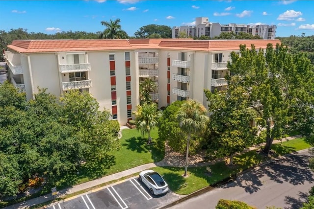 2630 Pearce Dr Unit 404, Clearwater, FL 33764 - view of property with uncovered parking
