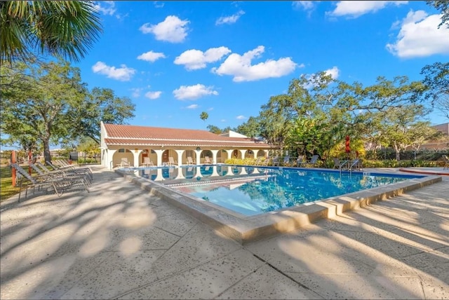 view of pool with a patio