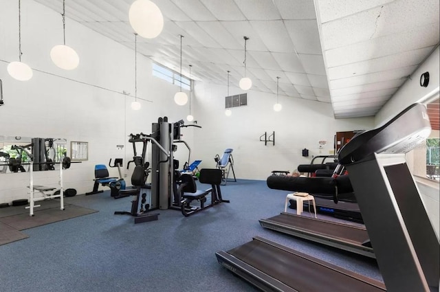 2630 Pearce Dr Unit 404, Clearwater, FL 33764 - gym featuring a paneled ceiling, visible vents, and a towering ceiling