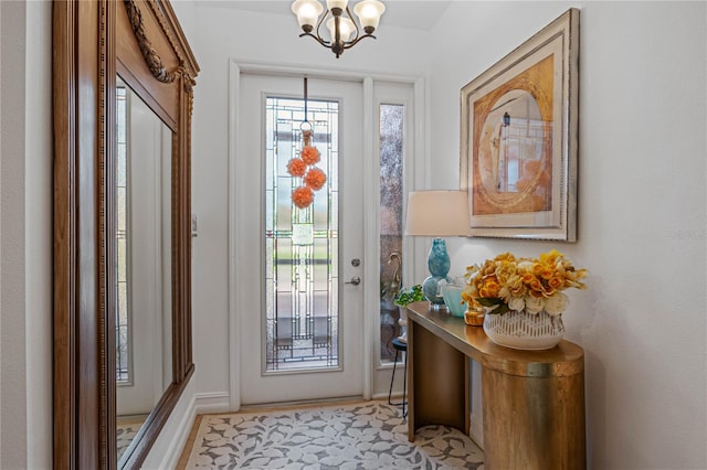 doorway with an inviting chandelier