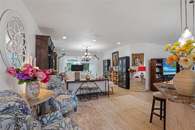 living room featuring a chandelier