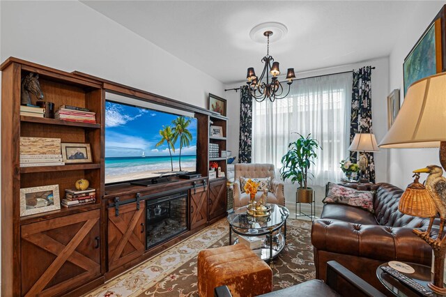 living room with a notable chandelier