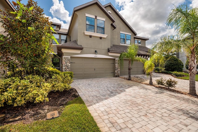 view of front of property with a garage