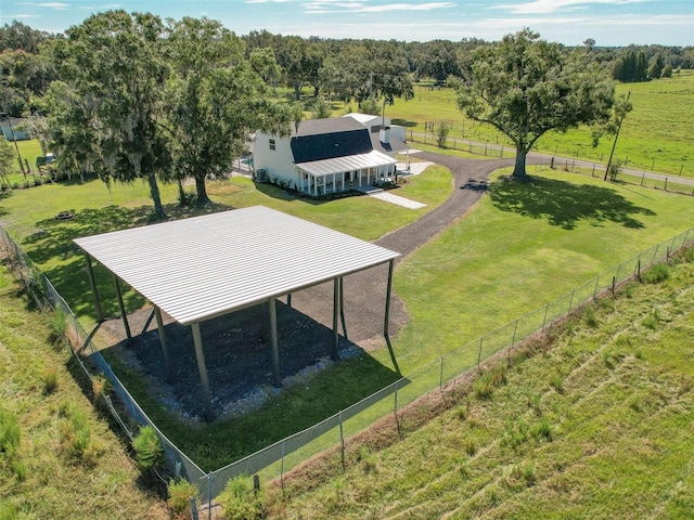 birds eye view of property featuring a rural view