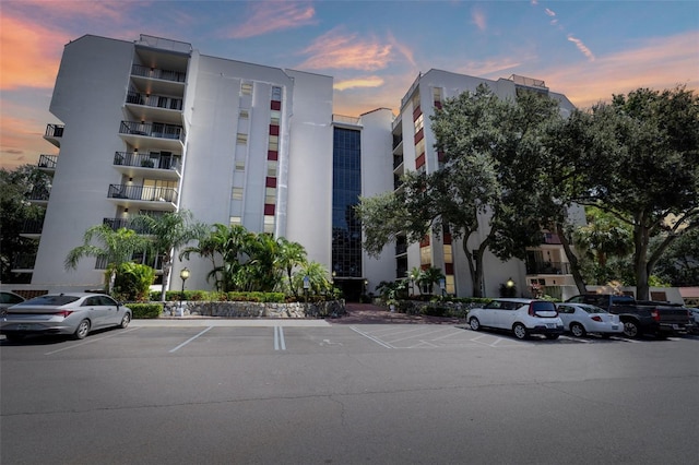 view of outdoor building at dusk