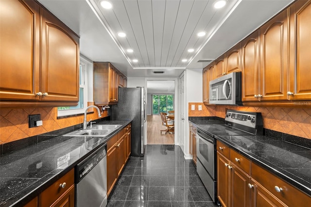 kitchen featuring stainless steel appliances and sink