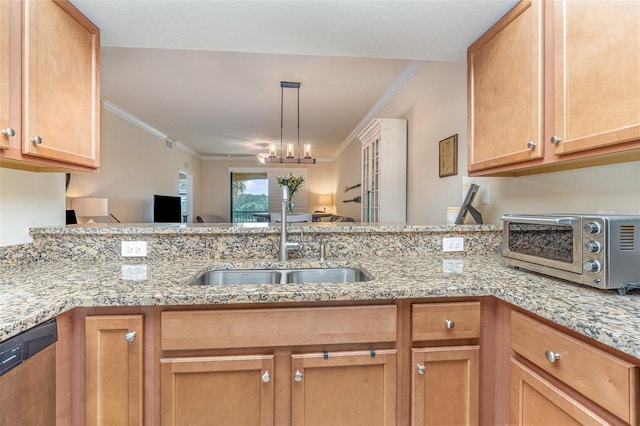 kitchen with stainless steel dishwasher, a peninsula, crown molding, and a toaster