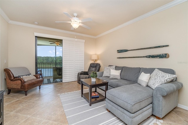 living area with light tile patterned floors, ornamental molding, and a ceiling fan