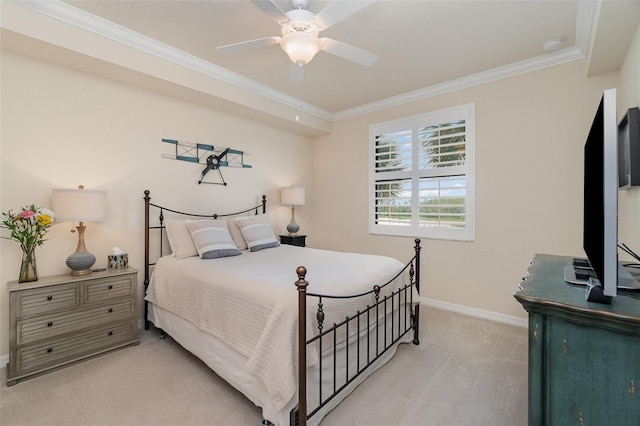 bedroom featuring baseboards, light colored carpet, ceiling fan, and crown molding