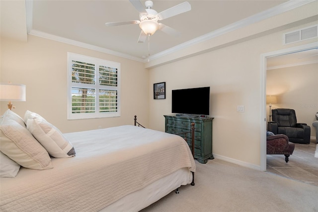 bedroom featuring visible vents, a ceiling fan, crown molding, baseboards, and light colored carpet