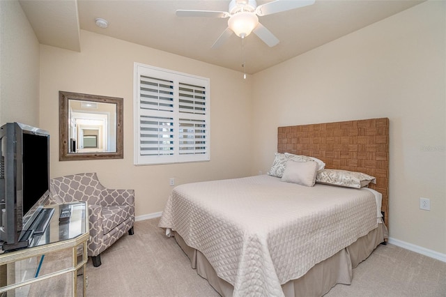 bedroom featuring baseboards, carpet, and a ceiling fan