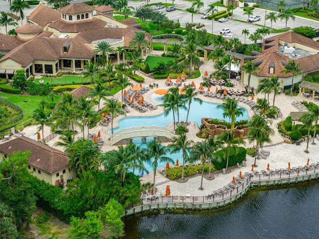 bird's eye view featuring a residential view and a water view