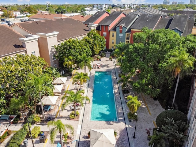 view of swimming pool with a residential view