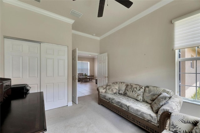 carpeted living room featuring high vaulted ceiling, ceiling fan, and ornamental molding