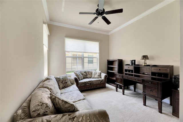 office area with ceiling fan, light colored carpet, and crown molding