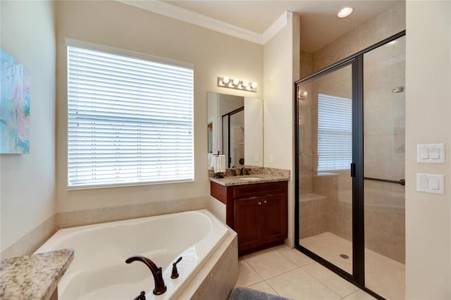 bathroom with tile patterned flooring, vanity, separate shower and tub, and ornamental molding