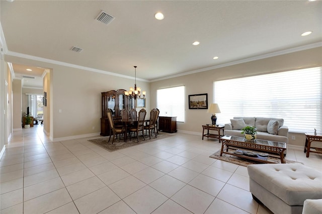 tiled living room with an inviting chandelier and ornamental molding