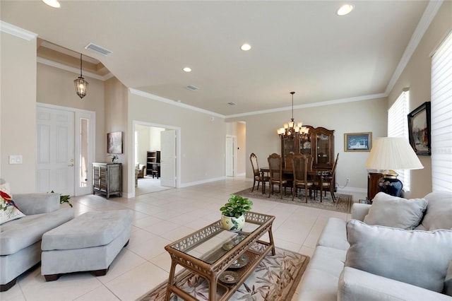 living room with crown molding, light tile patterned flooring, and a chandelier