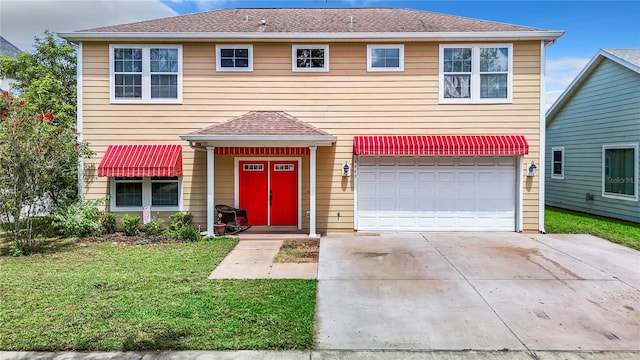 view of front facade featuring a front yard