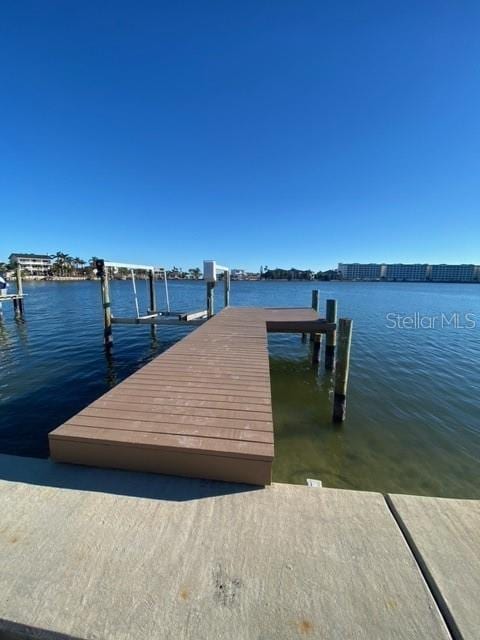 dock area featuring a water view