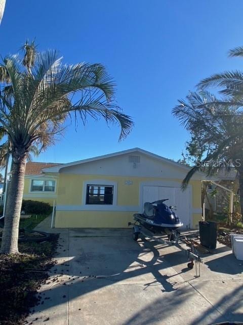 view of property exterior with a patio