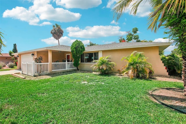 ranch-style home with a front lawn