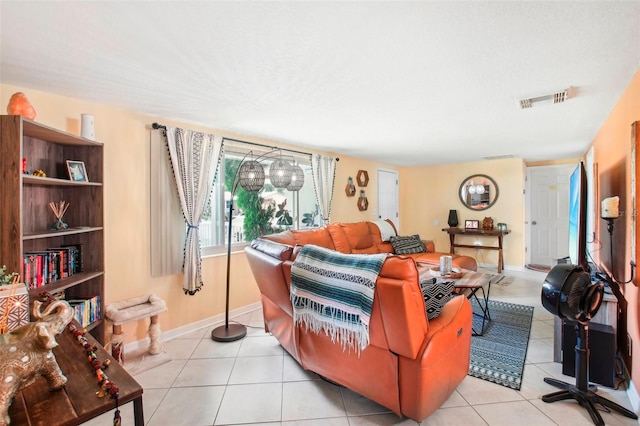 living room with light tile patterned floors