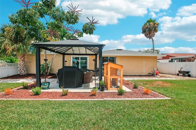 exterior space featuring a patio area and a gazebo