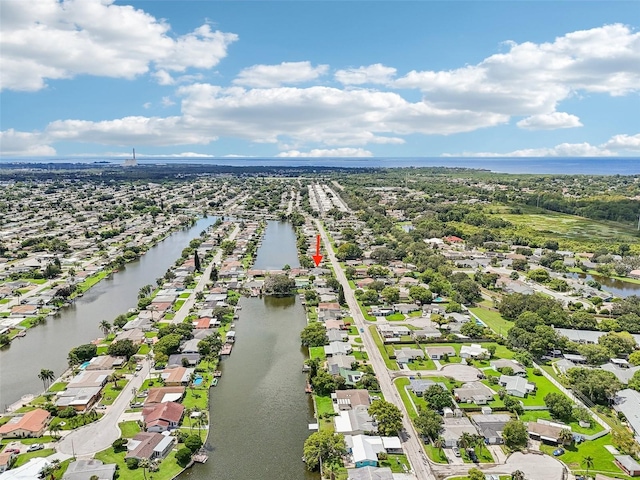 bird's eye view with a water view