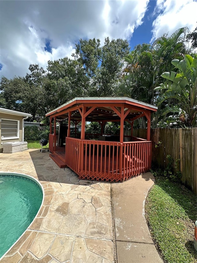 exterior space featuring area for grilling, a patio area, and a gazebo