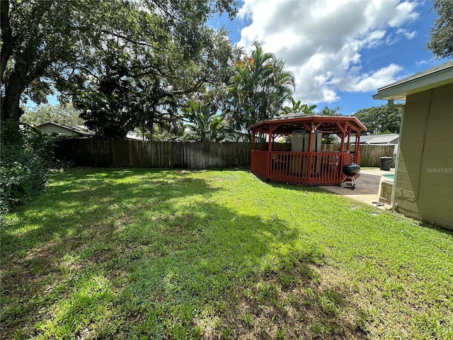 view of yard featuring a patio area and a gazebo