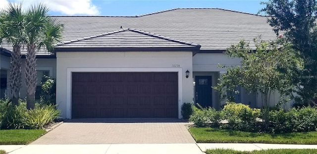 view of front of property with a garage