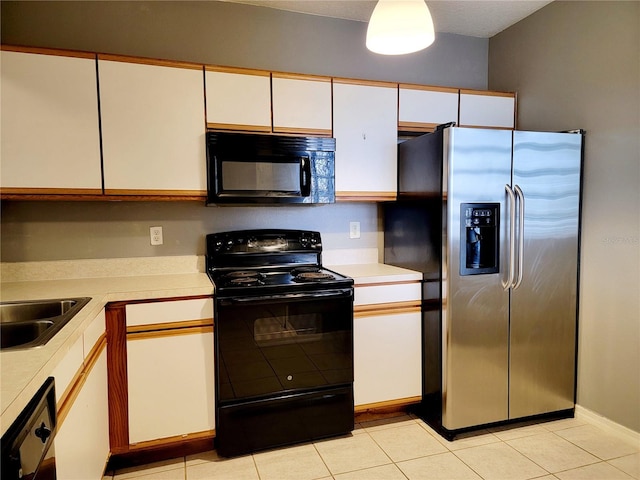 kitchen with black appliances, white cabinetry, sink, and light tile patterned flooring