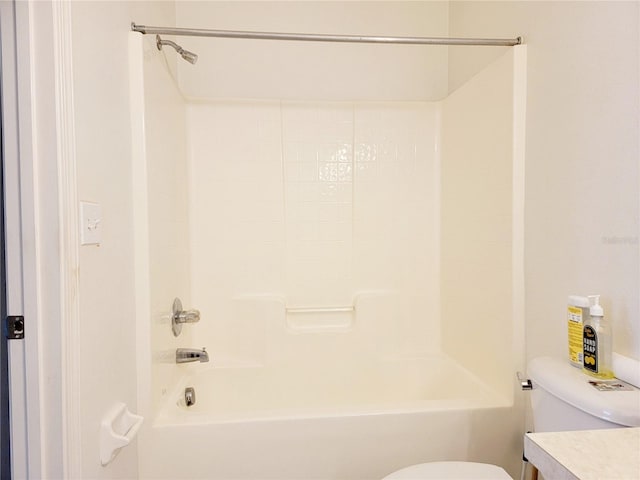 full bathroom featuring vanity, toilet, and  shower combination