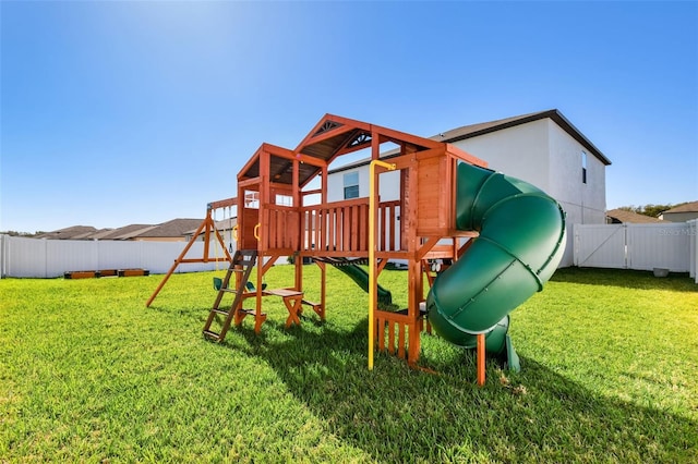 view of jungle gym with a lawn