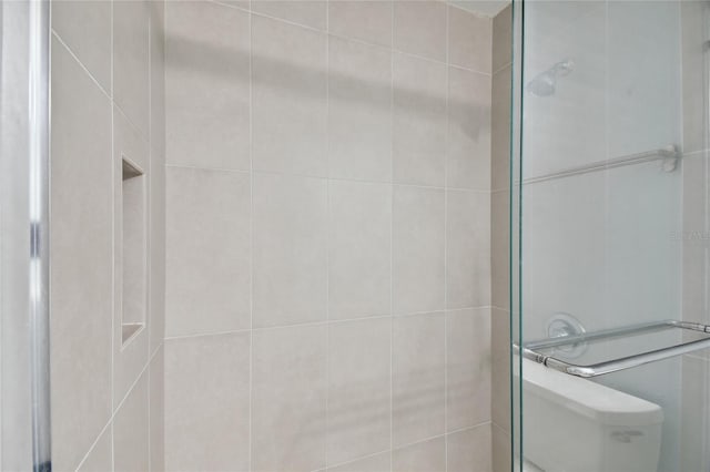 bathroom with a shower stall