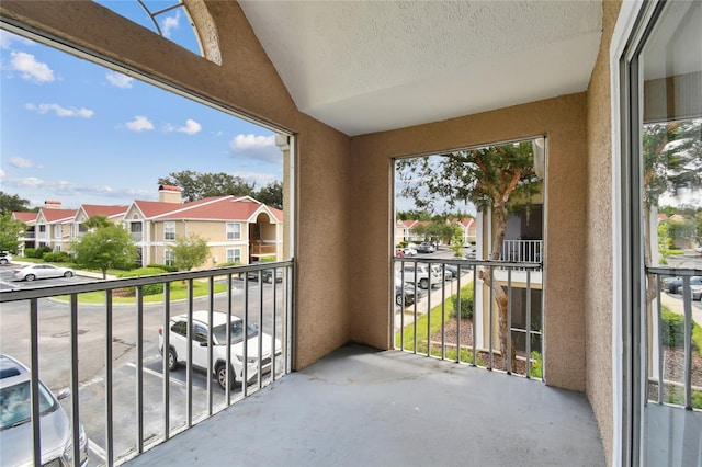 balcony featuring a residential view