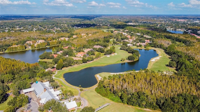 birds eye view of property featuring a water view, view of golf course, and a view of trees