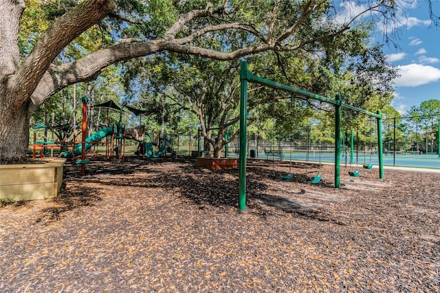 community jungle gym with fence