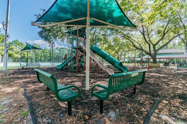 community playground featuring fence