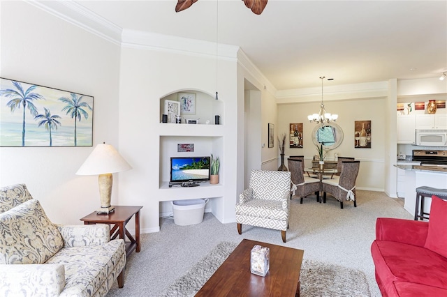 living area featuring ornamental molding, light colored carpet, built in features, and ceiling fan with notable chandelier