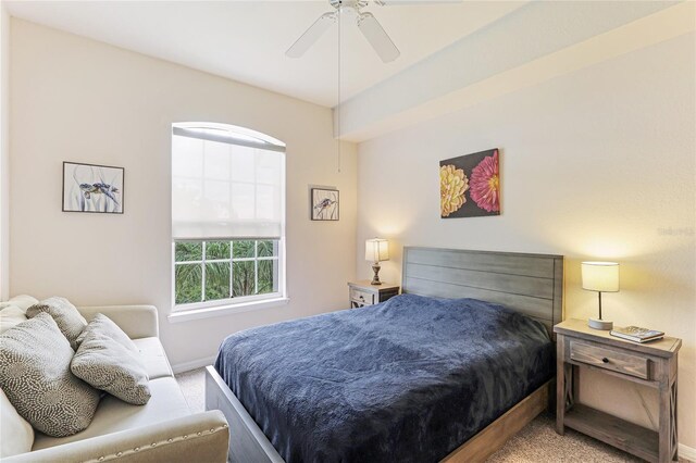 bedroom with ceiling fan and carpet