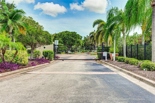 view of gate with fence