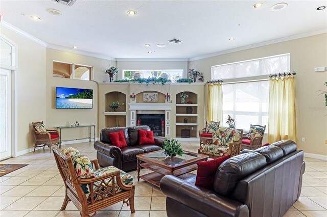 tiled living room featuring built in shelves and crown molding