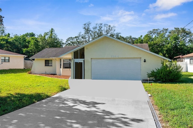 ranch-style house with a garage and a front yard