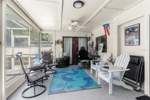 sunroom / solarium with ceiling fan