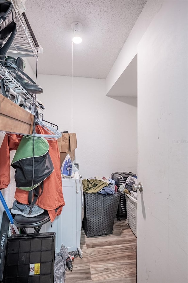 storage room with separate washer and dryer