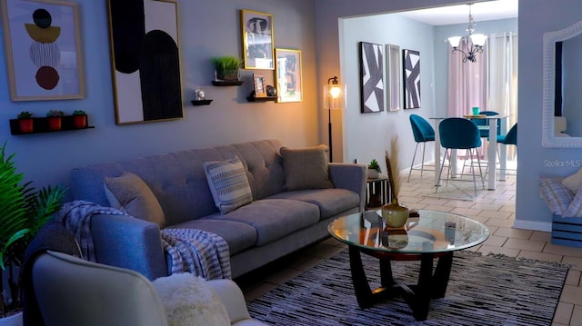 tiled living room featuring a notable chandelier